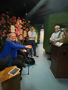 Dr. Curry presenting donation check to Director David Green