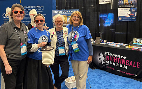 Betty Long and colleagues at the AONL booth