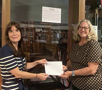 Wheelchair being prepared for donation at the archive